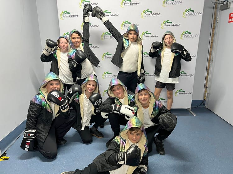 Our boys dance troop dressed as boxers after a performance